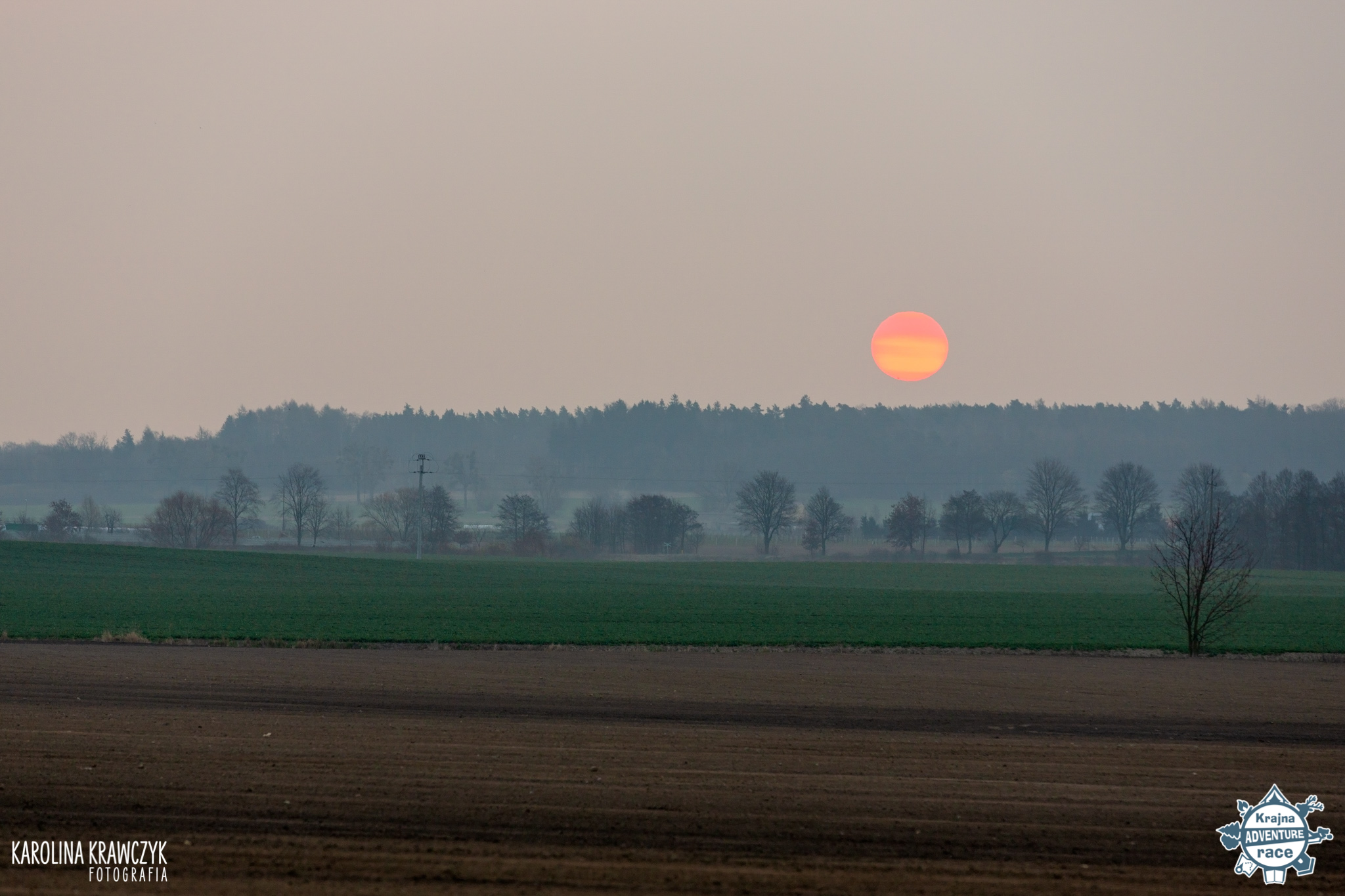 Logo regionu Krajna na tle wydarzenia